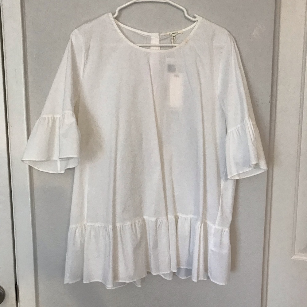 White Ruffle Sleeve Peplum Top